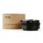 URTH objektyvo montavimo adapteris Nikon F į Nikon Z su rankiniu fokusavimu ir raudonu indikatoriaus šviesos šalia rudos dėžutės su užrašu 'URTH LENS MOUNT ADAPTER'.