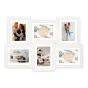 Elegantiškas Zep Photo Frame XK472W Oviedo 6x 10x15 / 15x20 cm koliažas su šešiais nuotraukų rėmeliais, išdėstytais ant sienos.