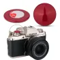 Raudonas minkštas išleidimo mygtukas Fujifilm X-T100 kamerai, gerinantis užrakto komfortą ir mažinantis vibraciją