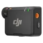 Bezlėšų mikrofonas DJI Mic Mini 2 su tekstūruotu rankeniu, oranžiniais akcentais ir LED indikatoriais