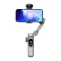 AOCHUAN X Pro gimbal su AI jutikliais, laikantis išmaniojo telefono stabiliai filmavimui, su OLED ekranu ir elegantišku pilku dizainu.
