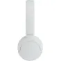 Panasonic RB-HF630BE-W belaidė ausinė - elegantiškas baltas dizainas su išlenktu pagrindu ir gamintojo logotipu, matoma iš apačios