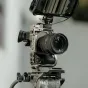 Tilta Sony FX2 kameros titano pilnasis apsauginis kėdė su skystojo galvos statyvu, užtikrinantis tvirtą aliuminio apsaugą ir šaltojo batų montavimo galimybes.