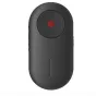Insta360 Mini nuotolinis valdymas prietaisas INST11069, kompaktiškas juodas įrenginys su apvaliu viršumi ir raudonu indikatoriaus šviesa, turintis vieną vertikalią mygtuką belaidžiam kameros valdymui iki 10 metrų.
