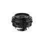 Thypoch Ksana 21mm f/3.5 ASPH plati kampo objektyvas Leica M monturoms, juodos spalvos, priekis rodomas su nuimtu priekiniu dangteliu, su vintage blizgesiu