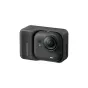 Insta360 GO Ultra Creator Bundle juodoje veidrodinė akcinė kamera šono vaizdas, akcentuojantis kompaktišką dizainą ir priekinio objektyvo sritį