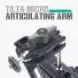 Tilta Micro artikuliuojama rankena artimu planu su artikuliuojamomis jungtimis ir 1/4-20 vyrišku sriegiu monitorių ar šviestuvų montavimui, pagaminta iš aliuminio lydinio