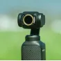 Vaxis Movmax ND filtro rinkinys DJI Pocket 3 kamerai su magnetiniu ND8 filtru, pabrėžiančiu apvalų dizainą ir greitą keitimą kinematografiniams išorės vaizdams.