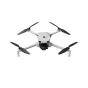 DJI Lito 1 bepilotis orlaivis stacionarioje padėtyje su ištiestais keturiais sraigtais, elegantiško balto dizaino su juodais akcentais, matomas kameros gimbal, paruoštas skrydžiui.