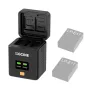 ZGCINE Canon LP-E17 baterijų krovimo dėžė su atviru dangteliu, dviejų baterijų slotais, OLED ekranu, rodančiu įtampą, ir atminties kortelių skyreliais.
