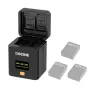 ZGCINE GoPro 13 krovimo dėžė su OLED ekranu, atidarytas dangtelis rodo tris baterijų vietas ir kortelių saugyklas SD/TF kortelėms