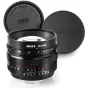 Meike 50mm f/0.95 greitas prizmės objektyvas Sony E-mount su atviru objektyvo dangteliu, matomas rankinis fokuso žiedas ir 13 lapelių diafragmos dizainas
