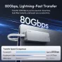 Ulanzi DT580 Thunderbolt 5 M.2 NVMe SSD korpusas su 80 Gbps perdavimo greičiu, prijungtas prie nešiojamojo kompiuterio, rodantis greitas duomenų perdavimo galimybes
