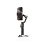 DJI Osmo Mobile 8 Standard Combo su įmontuotu telefonu, rodantis 360° sukimosi galimybę, įmontuotą statyvą ir išsikišantį stiebą, idealiam įvairioms kūrimo perspektyvoms ir stabiliam filmavimui