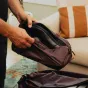 Peak Design Shoe Pouch Eclipse – kompaktiškas ultralengvas batų organizatorius su savitaisomu ripstopo audiniu ir patvariu UltraZip uždaru kelionėms