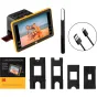Kodak Slide N Scan Max skaitmeninis filmų skeneris su 7 colių LCD ekranu, rodančiu skenuotą šeimos nuotrauką, pilnas priedų komplektas su adapteriais 135, 110 ir 126 formatams, USB kabelis, valymo šepetys ir naudotojo instrukcij