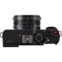 Panasonic Lumix L10 fotoaparato viršus su Leica 24-75 mm f/1.7-2.8 objektyvu, akcentuojant diafragmos žiedą, valdymo ratukus ir rankinius nustatymus profesionaliam fotografavimui ir vaizdo kūrimui.