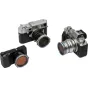 Fujifilm fotoaparatas su aukštos kokybės objektyvu, demonstruojantis optinį aiškumą ir profesionalią fotografijos įrangą