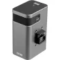 ZHIYUN Battery Grip for Molus X100 su 2600mAh talpa, USB-C prievadu su užrašu 'IN/OUT' ir keturpinio jungtimi, su tekstūru ir kompaktišku dizainu.