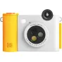 Kodak Smile+ kompaktiška momentinė kamera su ryškiu geltonu tekstūruotu korpusu, baltu priekinio skydeliu ir sukamu objektyvu kūrybiniams efektams