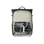 Aerial view of an open PGYTECH OneGo Roamer Tote Backpack 25L smėlio khaki spalvos, demonstruojantis organizuotus skyrius su Sony kamera, dronu, objektyvais ir baterijomis.