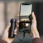 PGYTECH Pocket Battery Handle su USB-C įkrovimo portu ir išsiskleidžiančiu trikojų, didinančiu DJI Pocket 3 įrašymo laiką