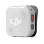 DJI Mic Mini 2S bevielis lavalier mikrofono siųstuvas su skaidriu magnetiniu priekinio dangčiu, raudonu maitinimo mygtuku ir šoninėmis kontrolėmis