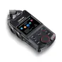 Juodas Tascam Portacapture X6 rankinis daugialypis įrašymo įrenginys su 2,4 colių spalvotu jutikliniu ekranu, rodančiu programų ikonėmis, raudonu valdymo mygtuku, XLR įėjimais ir integruotais kondensatoriniais mikrofonais, ideal