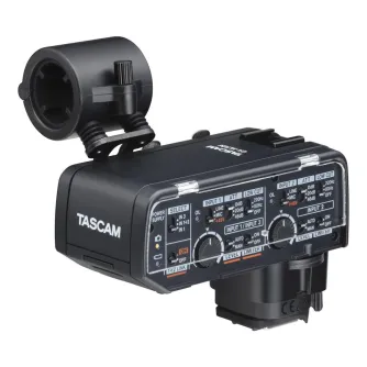 Tascam XLR mikrofonų adapteris Canon beispoguļu kameroms su nuimamu šoko montu, valdymo panele su jungikliais ir rankenėlėmis, Canon priedų karšta koja, skaidriu apsauginiu dangteliu ir galiniu vaizdu, rodančiu baterijų skyrių i Tascam XLR mikrofonų adapteris Canon beispoguļu kameroms su nuimamu šoko montu, valdymo panele su jungikliais ir rankenėlėmis, Canon priedų karšta koja, skaidriu apsauginiu dangteliu ir galiniu vaizdu, rodančiu baterijų skyrių i