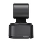 Artimas vaizdas į OBSBOT Tiny 2 Lite PowerUp Combo bazę ir reguliuojamą mini kamuoliuko galvutę, su elegantišku juodu dizainu, cilindrine viršūne ir stačiakampiu pagrindu, priešais paprastą baltą foną.