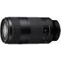 Sony FE 100-400mm f/5.6-8.0 OSS supertelefoto objektyvas, rodomas pilno šoniniame vaizde su priekinio elementu, fokusavimo atstumo skale ir užrakto jungikliu