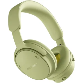 Bose QuietComfort 2-osios kartos belaidės ausinės eukalipto žalia spalva su paminkštintu galvos juosta, minkštais ausų pagalvėlėmis ir matomu Bose logotipu.