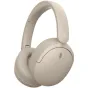 Beige Sony WH-CH730N bežinys, pusės kampas su įkūręfoldiniu dizainu, Dual Noise Sensorų šildymu ir mikrofonu.