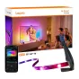 Lepro STV1 Wi‑Fi TV backlight kit, 3,6 m RGB strip, LightIMS™ kamera, AI‑žvalgiai, muzikos sinkronizacija ir Alexa/Google Assistant valdymas, su paketu, smartfonu ir įkrovimo įranciais.